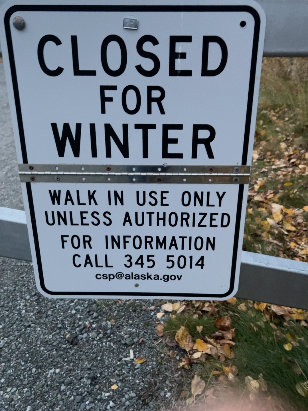 Winter gate sign reading Closed for Winter, Walk In Use Only Unless Authorized